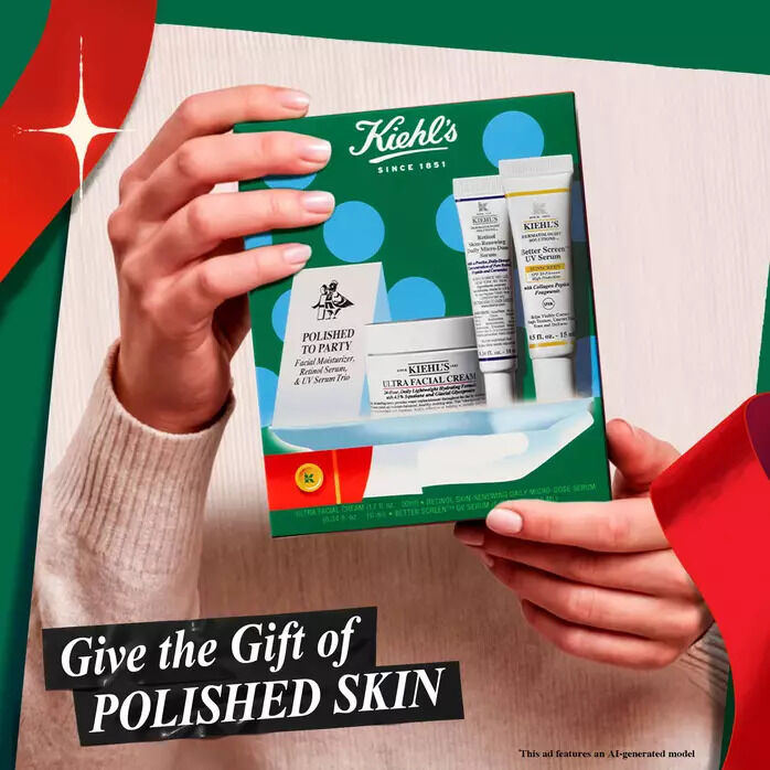 Hands hold a Kiehl's "Polished to Party" holiday gift set featuring Ultra Facial Cream, Retinol Serum, and Better Screen UV Serum against a festive red and green background.​