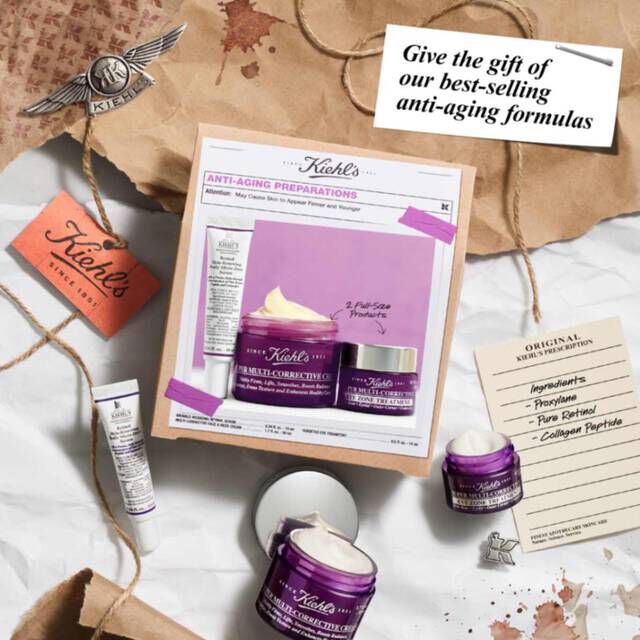 Anti-Aging Preparations Set Box on top of paper with elements scattered around​